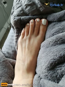 16194805