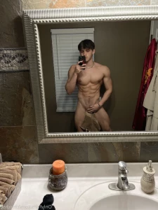 7677772