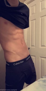 6973318