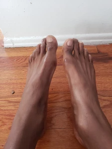 7036998