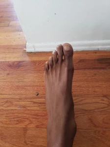 7037086