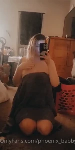 7053077