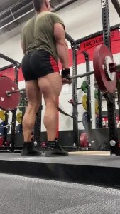 6940933