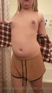 6929997