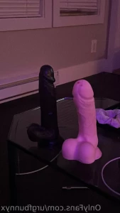 6973891