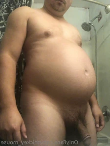 12357565