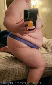 12738859